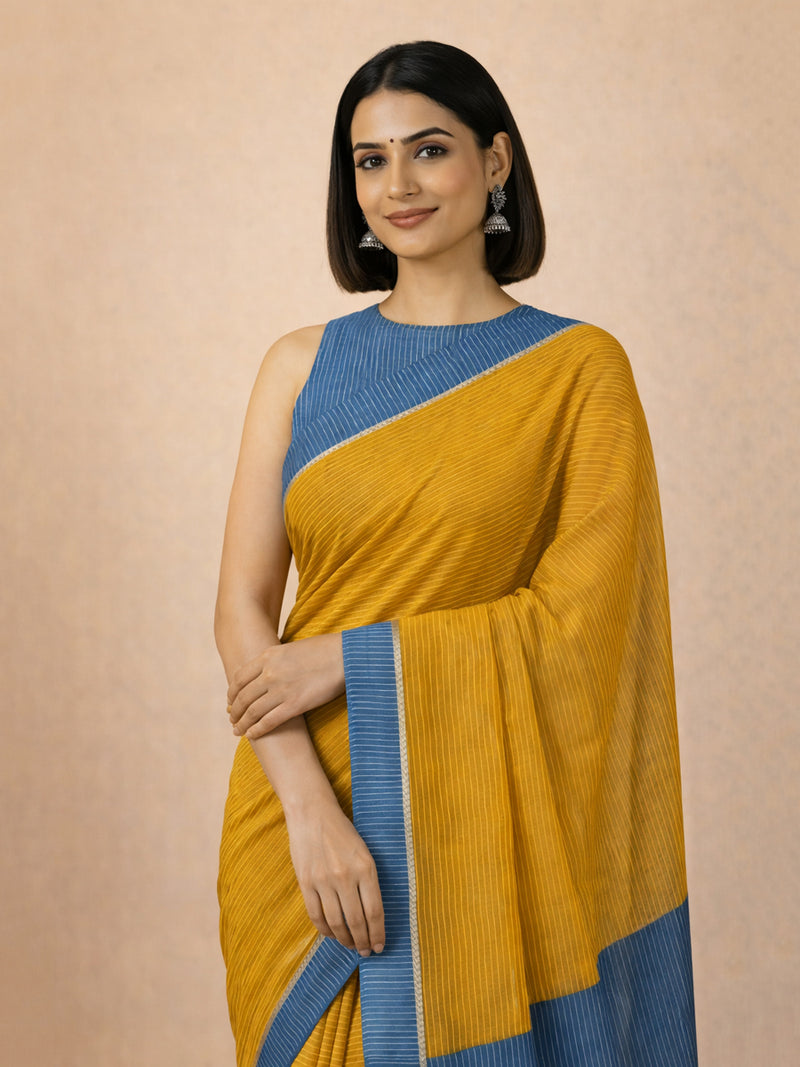 Dhwani x Rozaana | Turmeric Yellow With Indigo Contrast Saree In Silver Striped Pure Cotton