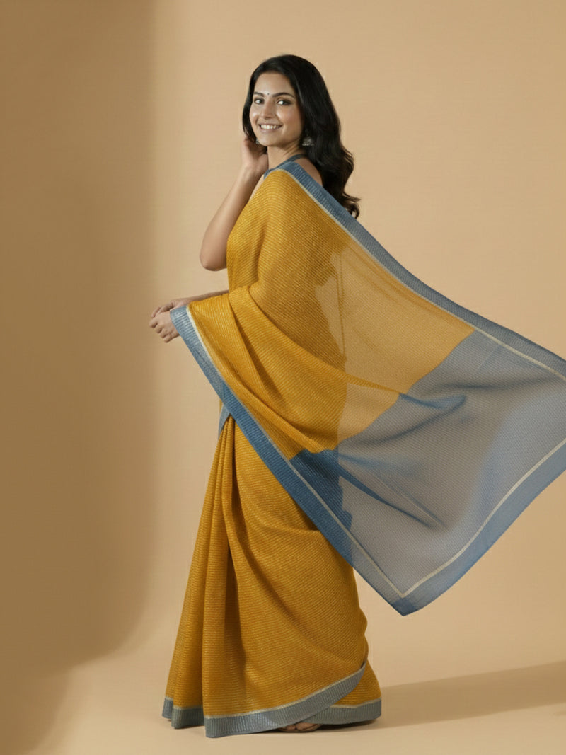 Dhwani x Rozaana | Turmeric Yellow With Indigo Contrast Saree In Silver Striped Pure Cotton