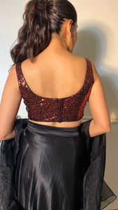 Sheela x Tyohaar | Sleeveless Black & Red Sequined Shimmer Saree Blouse with Round Neck