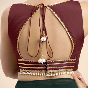 Ishika x Tyohaar | Burgundy Sleeveless FlexiFit™ Saree Blouse with Beetle Leaf Neckline with Gota Lace and Back Cut-out with Tie-Up - Binks  