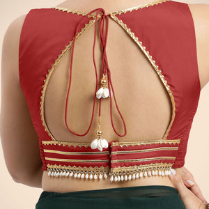 Ishika x Tyohaar | Crimson Red Sleeveless FlexiFit™ Saree Blouse with Beetle Leaf Neckline with Gota Lace and Back Cut-out with Tie-Up - Binks  