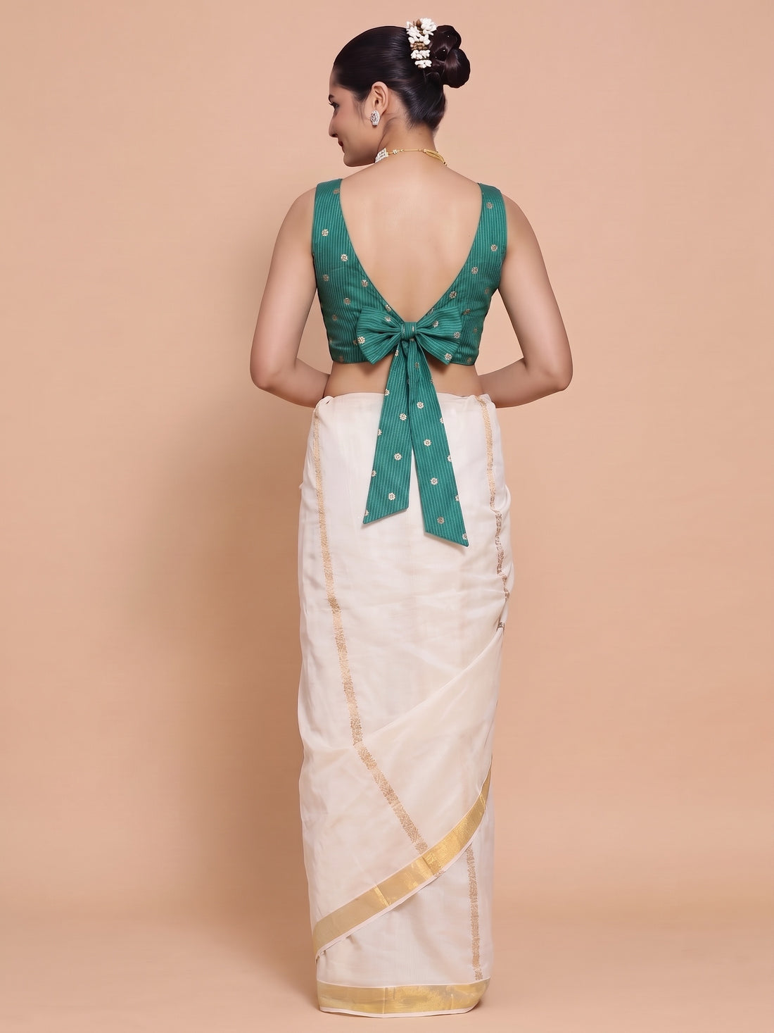 Kasavu-Kit Kasavu Saree with Anika Sleeveless blouse in Mayur Green Striped Peacock Brocade