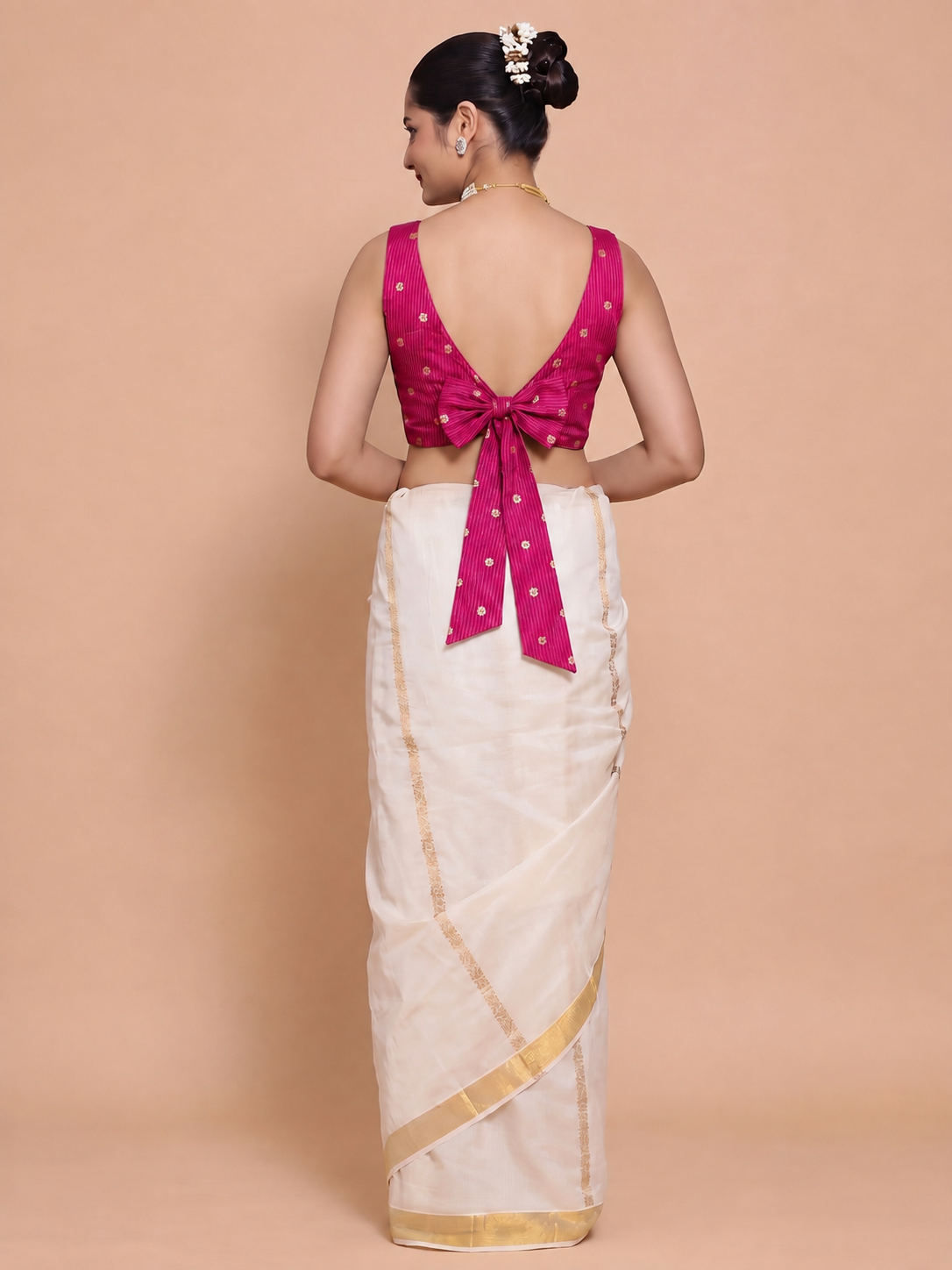 Kasavu-Kit Kasavu Saree with Anika Sleeveless blouse in Rani Pink Striped Peacock Brocade