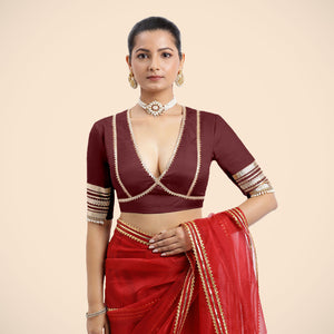 Nafeeza x Tyohaar | Burgundy Embellished Elbow Sleeves FlexiFit™ Saree Blouse with Plunging V Neckline with Tasteful Golden Gota Lace