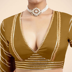 Navya x Tyohaar | Bronze Gold Elbow Sleeves FlexiFit™ Saree Blouse with Plunging V Neckline with Tasteful Gota Lace