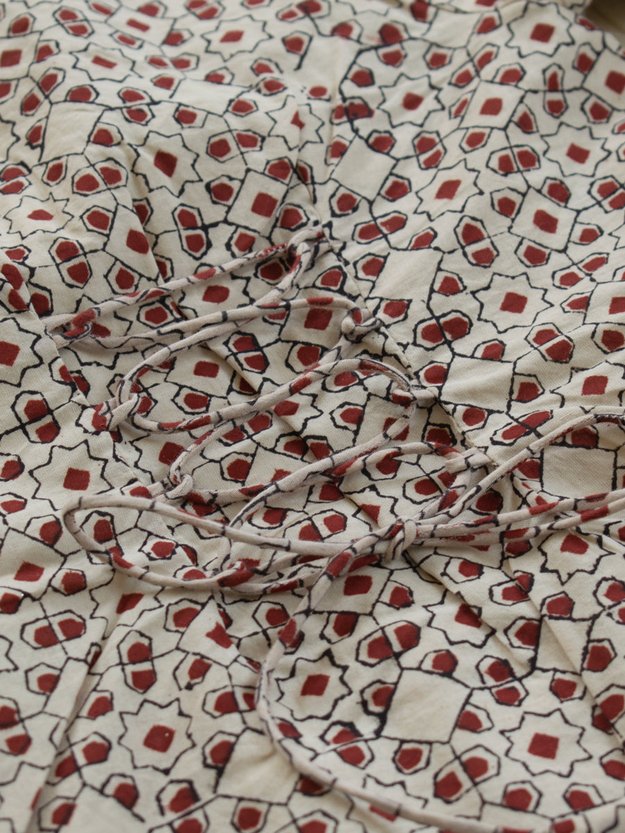 Rangoli x Tyohaar | Angrakha-Sharara Set in Cream & Red Geometric Block Print Cotton