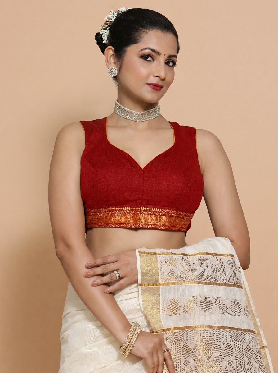Kasavu-Kit Kasavu Saree with Varsha Sleeveless blouse in Chilli Red Mangalgiri
