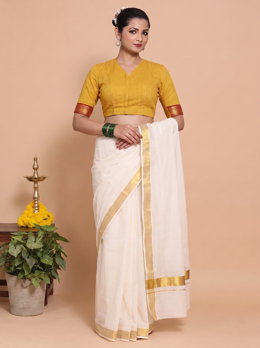 Kasavu-Kit Kasavu Saree with Varsha Sleeveless blouse in Turmeric Yellow Mangalgiri