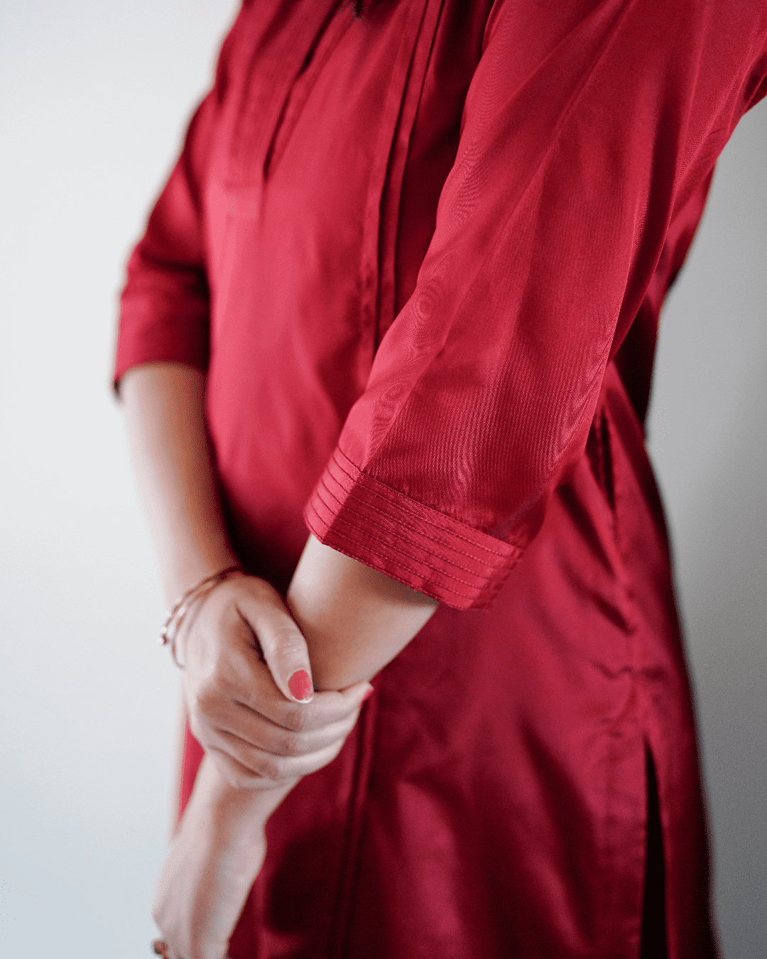 Barkha x Tyohaar Kurta, in Red Vegan Silk, featuring three quarter sleeves and overlap v-neckline, made for daily & work.